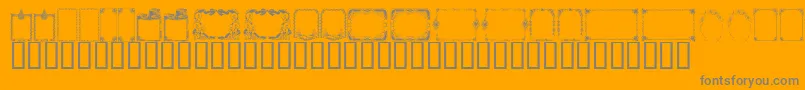 En savoir plus sur la police KrChristmasFrames Police KrChristmasFrames – polices grises sur fond orange