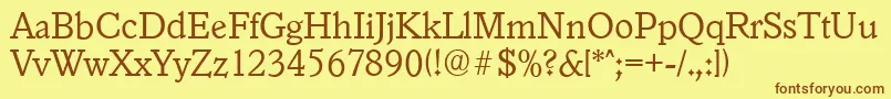 フォントGranadaserialLightRegular – 茶色の文字が黄色の背景にあります。