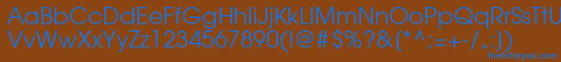 ItcAvantGardeCeGothicBook-Schriftart – Blaue Schriften auf braunem Hintergrund