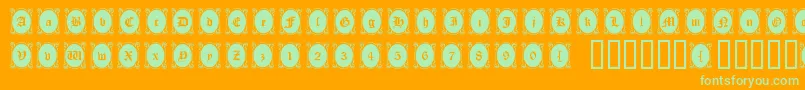Lookingglass Font – Green Fonts on Orange Background