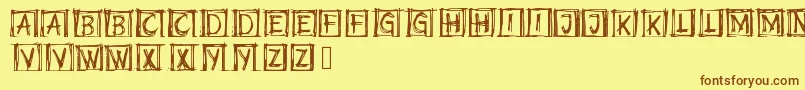 フォントSummrSketch – 茶色の文字が黄色の背景にあります。