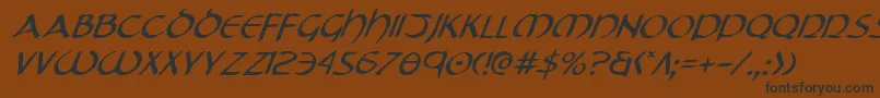 TristramItalic Font – Black Fonts on Brown Background