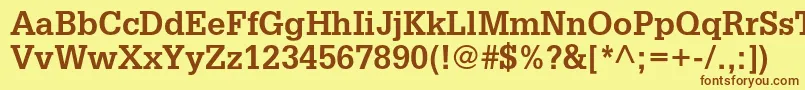 フォントGlyphaltstdBold – 茶色の文字が黄色の背景にあります。