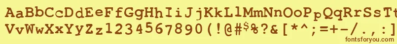 フォントToxica – 茶色の文字が黄色の背景にあります。