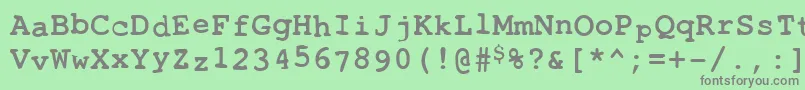 フォントToxica – 緑の背景に灰色の文字