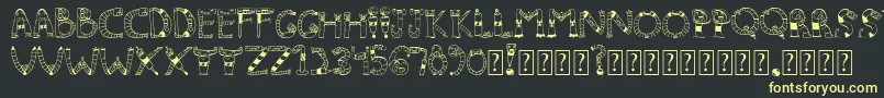 Clinkclank Font – Yellow Fonts on Black Background