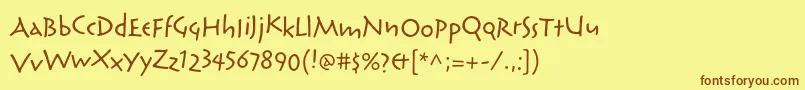 フォントReliqstdExtraactive – 茶色の文字が黄色の背景にあります。