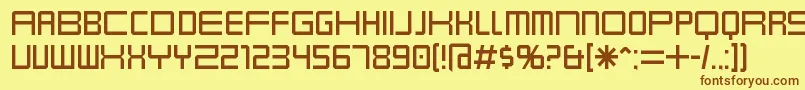 フォントKarnivol – 茶色の文字が黄色の背景にあります。