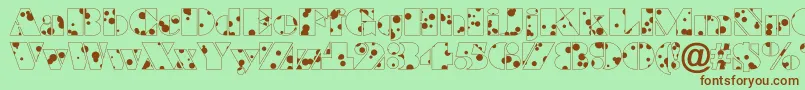 BraggadrRegular Font – Brown Fonts on Green Background