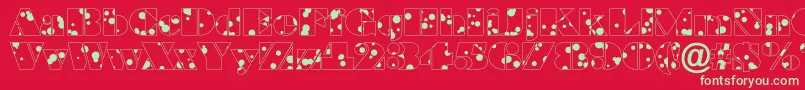 BraggadrRegular Font – Green Fonts on Red Background