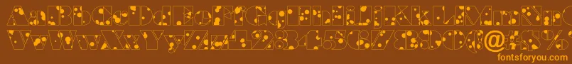 Fonte BraggadrRegular – fontes laranjas em um fundo marrom