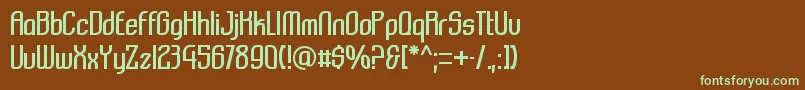 フォントKomikazba – 緑色の文字が茶色の背景にあります。