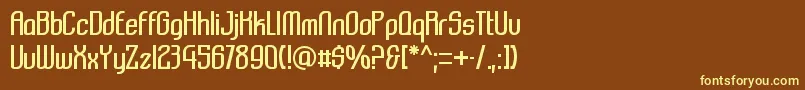 Komikazba-fontti – keltaiset fontit ruskealla taustalla