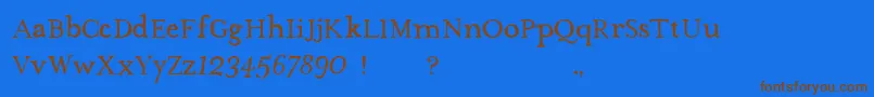 フォントTheMissusHandNormal – 茶色の文字が青い背景にあります。