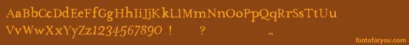 フォントTheMissusHandNormal – オレンジ色の文字が茶色の背景にあります。