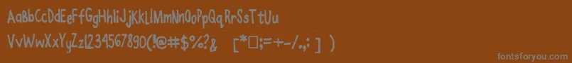 フォントJoanneenzymekinetics – 茶色の背景に灰色の文字