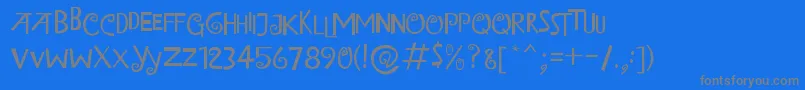 フォントIslandOfMisfitToys – 青い背景に灰色の文字
