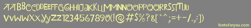 IslandOfMisfitToys Font – Yellow Fonts on Gray Background