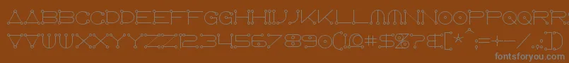 Шрифт Anglocelestial – серые шрифты на коричневом фоне