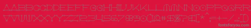 フォントAnglocelestial – 赤い背景に灰色の文字