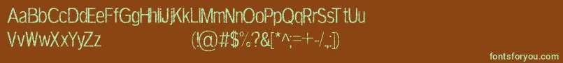 フォントTerbiumPersonalUseOnly – 緑色の文字が茶色の背景にあります。