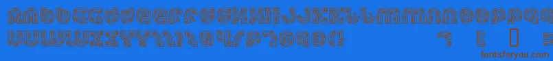 DreamlandStars Font – Brown Fonts on Blue Background