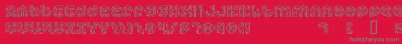 フォントDreamlandStars – 赤い背景に灰色の文字