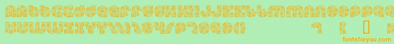 DreamlandStars-Schriftart – Orangefarbene Schriften auf grünem Hintergrund