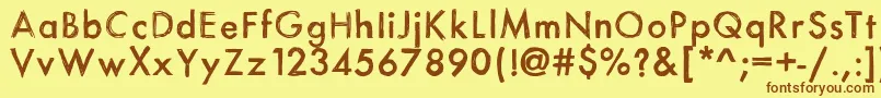 フォントItsasketch – 茶色の文字が黄色の背景にあります。