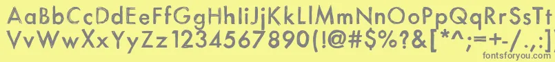 フォントItsasketch – 黄色の背景に灰色の文字