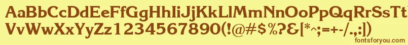 フォントKrlb – 茶色の文字が黄色の背景にあります。