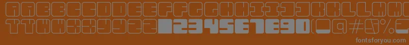 AarLight-fontti – harmaat kirjasimet ruskealla taustalla