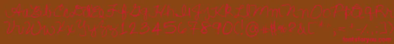 Lisasfirstclass Font – Red Fonts on Brown Background