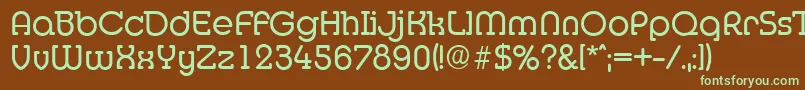 フォントMexicoserialRegular – 緑色の文字が茶色の背景にあります。