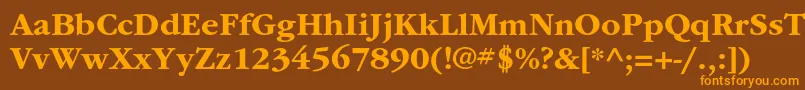 フォントItcgaramondstdBd – オレンジ色の文字が茶色の背景にあります。