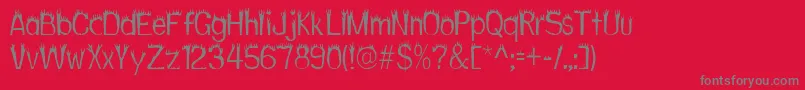 フォントHothead – 赤い背景に灰色の文字