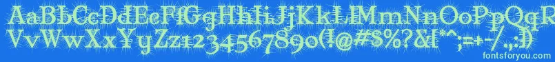 Mjdeg-Schriftart – Grüne Schriften auf blauem Hintergrund