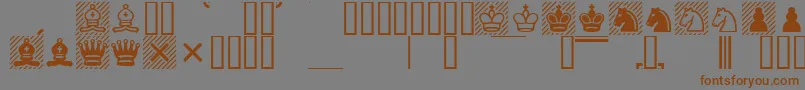 フォントChess1 – 茶色の文字が灰色の背景にあります。