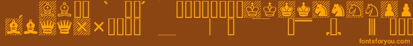 フォントChess1 – オレンジ色の文字が茶色の背景にあります。