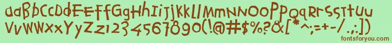 Agrafiell Font – Brown Fonts on Green Background