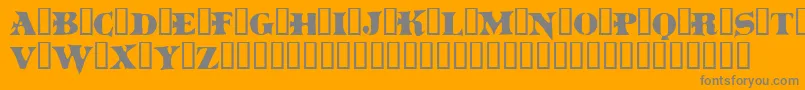 Boinkomatic-Schriftart – Graue Schriften auf orangefarbenem Hintergrund