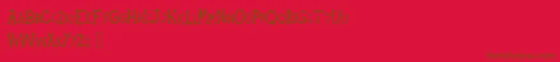 フォントIndernikCharcoal – 赤い背景に茶色の文字