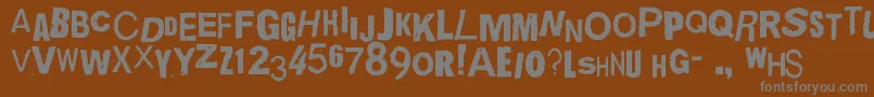 QuickEndJerk-fontti – harmaat kirjasimet ruskealla taustalla