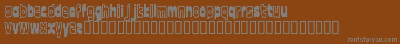 Czcionka FontTwelve – szare czcionki na brązowym tle
