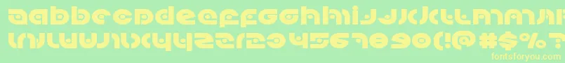 Kovacsspotexpand-Schriftart – Gelbe Schriften auf grünem Hintergrund