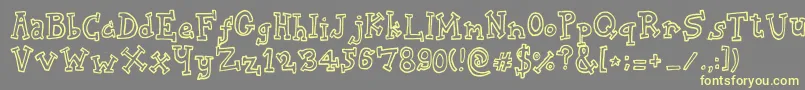 BiscuitTin Font – Yellow Fonts on Gray Background