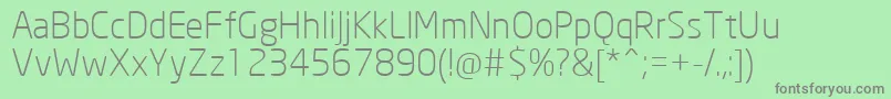 NeoSansCyrLight-fontti – harmaat kirjasimet vihreällä taustalla