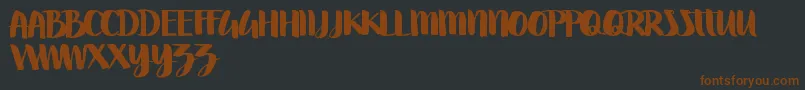 Шрифт Swettiest – коричневые шрифты на чёрном фоне