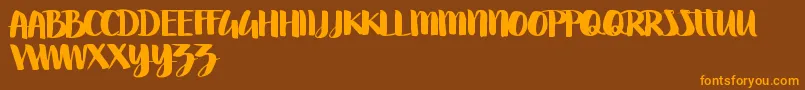 Swettiest Font – Orange Fonts on Brown Background