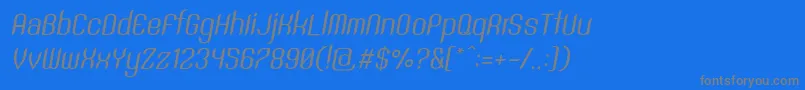 SntAnouvongRegularItalic-fontti – harmaat kirjasimet sinisellä taustalla